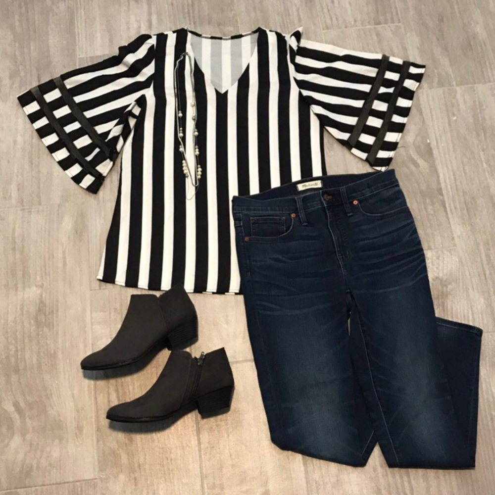 Modern striped black and white puff sleeve blouse